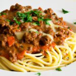 Speedy Baked Spaghetti: Hearty Beef Sauce in Minutes